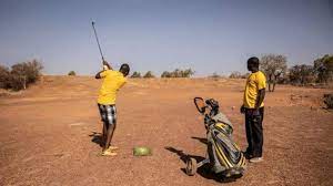 Is the sand trap a patch of green grass? In a few months, Burkina Faso's only golf course turns 50 years old: the Ouagadougou Golf Club. Its fairways are pure dirt. No water for irrigation. But the game's the same. (A typical golf course uses 757 million litres of water a year.)