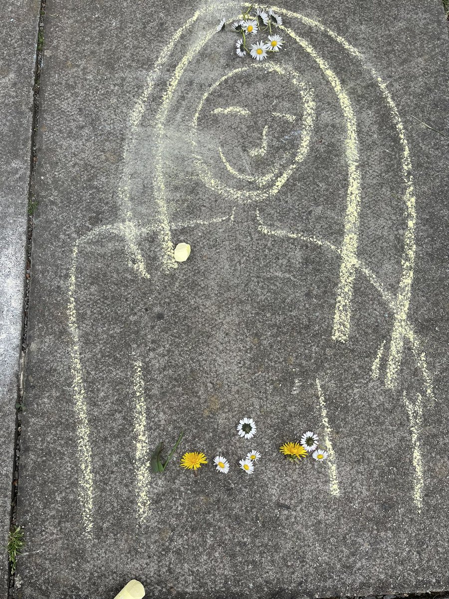 Primary One are learning that May is the month of Mary. We drew pictures of Mary in the playground.