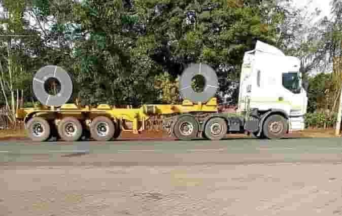 Yani a whole flat trailer carrying two rolls of 24 gauge mabati. wastage of Fuel and time