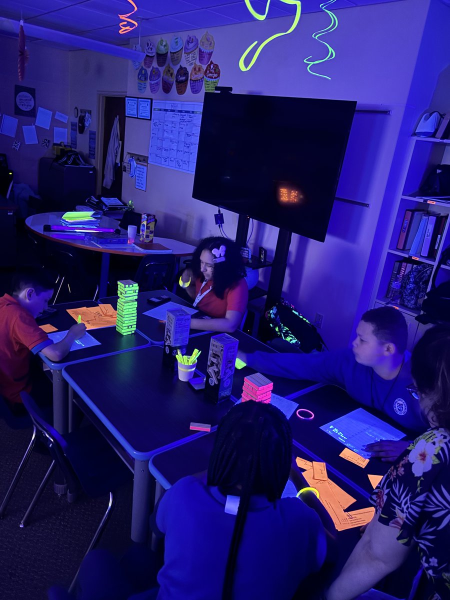 The games included Tic-Tac-Toe, Connect4, Jenga, and mystery cups. To make the review games even more fun, the room was blacked-out and covered with neon and glowing materials with black lights. The students were engaged and had lots of fun reviewing! #MTA #MathFun 🔆🔢