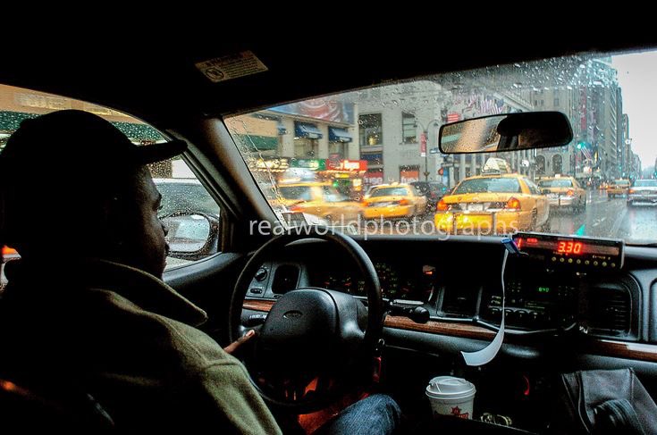 New York City seen through a rain-soaked can window. New York City, New York, USA. Gary Moore photo. Real World Photographs.  #newyork #taxi #cab #nyc #weather #usa  #unitedstates #garymoorephotography #realworldphotographs #nikon #photojournalism #streetphotography #photography