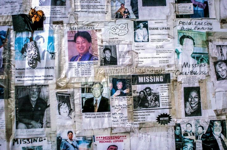 A haunting wall displays the missing and lost after the 9/11 attacks in 2001. New York City, USA. Gary Moore photo. Real World Photographs. #911 #terrorism #lost #missing #posters #newyork #usa  #garymoorephotography #realworldphotographs #nikon #photojournalism #photography