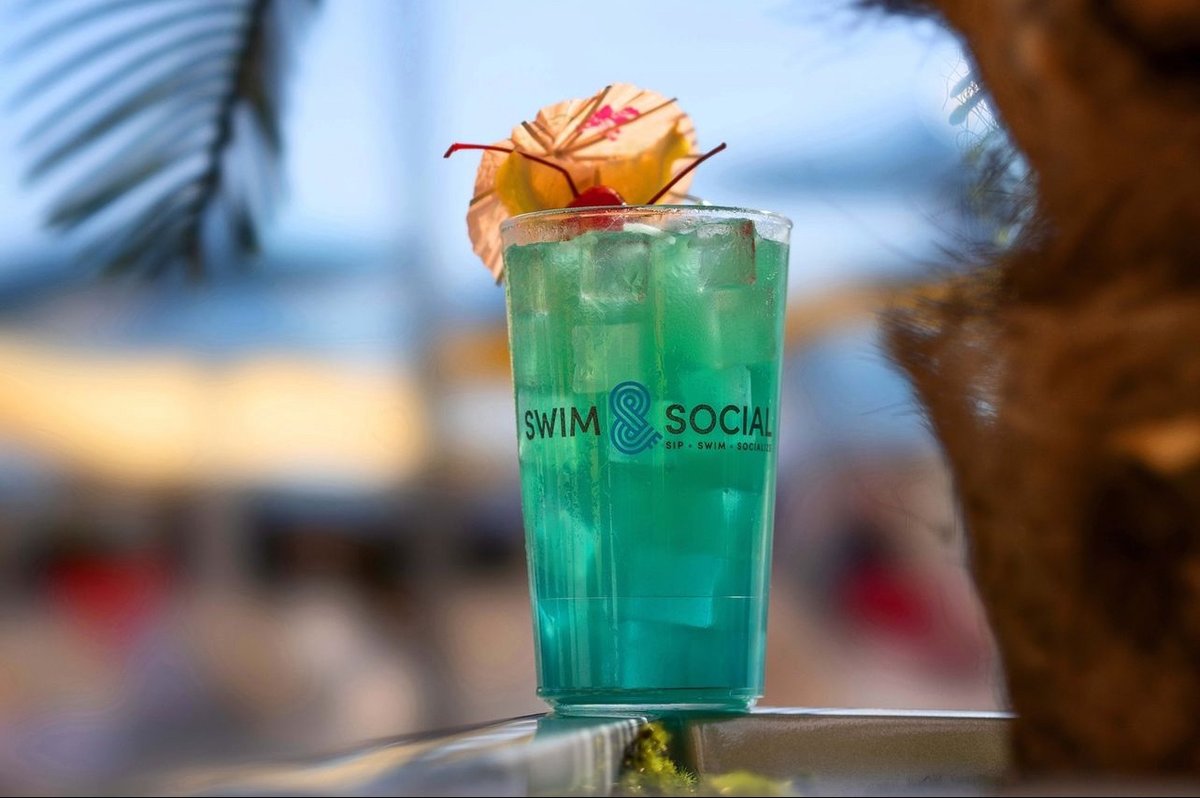 Here at Swim & Social, the water's cool, drinks are flowing, and the sun's got your back. Bring the swimsuits; we'll take care of the rest. Cheers!