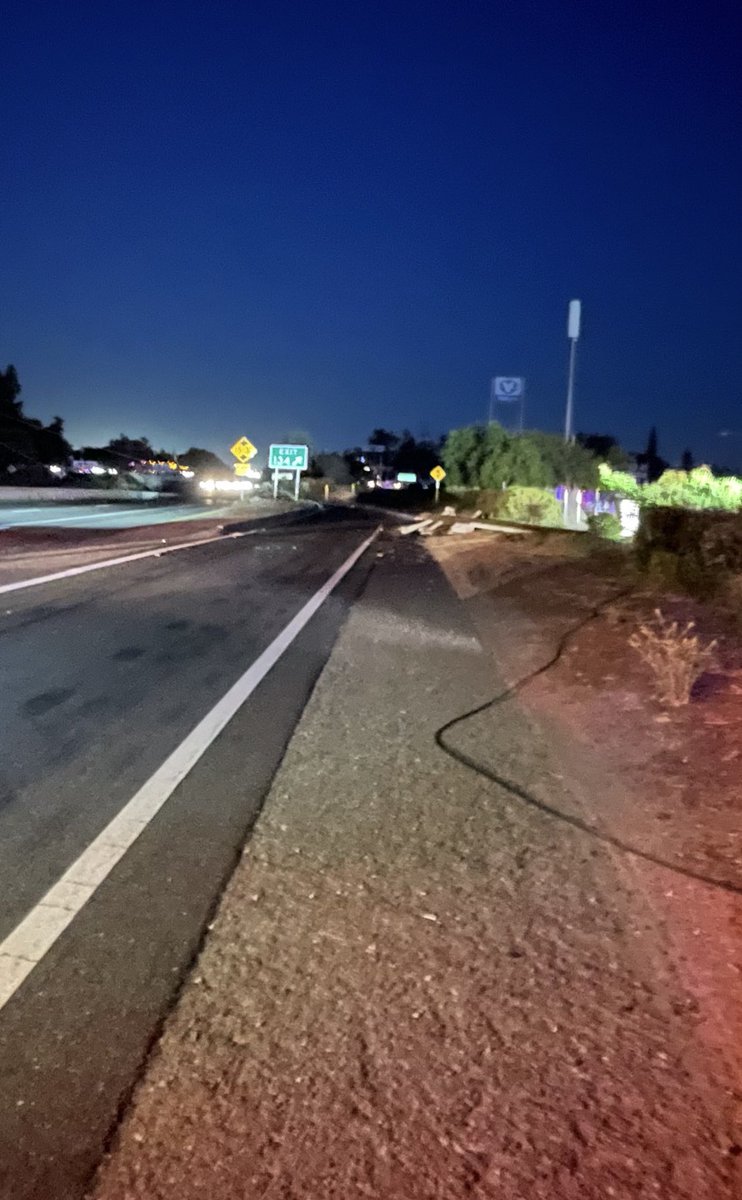 Traffic advisory 
northbound and southbound State Route 99 between Olive  and Belmont are currently shut down due to powerlines across all lanes of the freeway. Use alternate routes or expect lengthy delays. PG And E is on scene. As of 8:30 PM there is an unknown time to open.