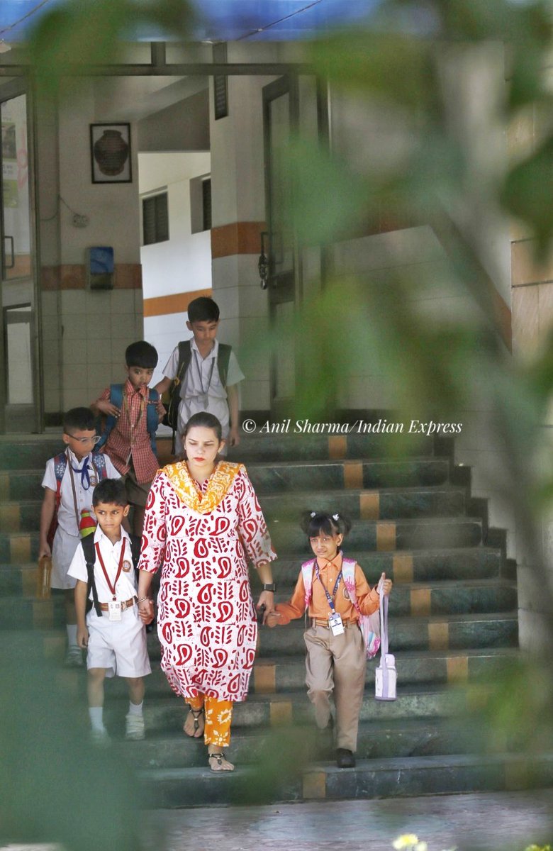 Students being evacuated from Andhra education society,DDU Marg after a bomb threat in new delhi on wednesday. @IndianExpress photo by @anilsharma07