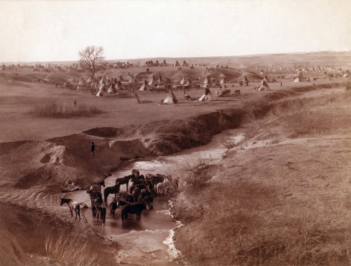 Lakota native American camp on river Brule near Pine ridge, South Dakota, 1891.