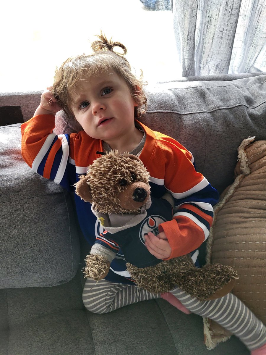 She's using obscene cuteness to convince me to stay up until puck drop. #Oilers #yeg