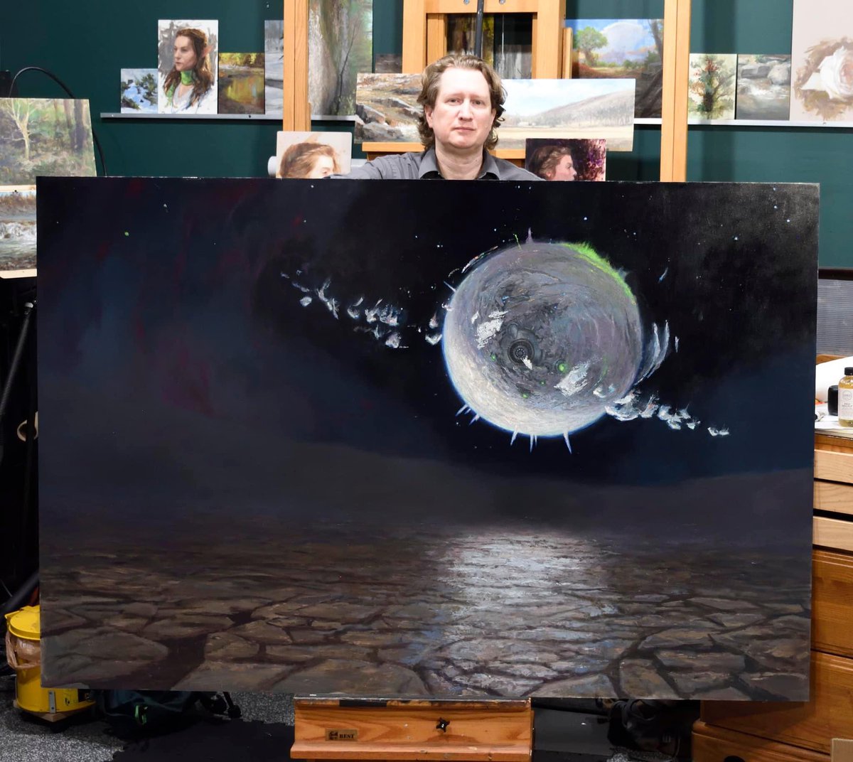 “Winter Moon” by Drew Baker from the upcoming MH3 set is 4’ x 6’ — purportedly the largest original painting for Magic so far.
