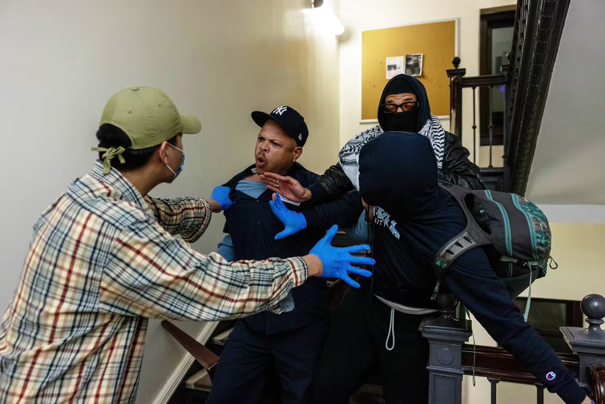 Look at this picture Want to know what the actual threat to the Democrats this election is? It's that the Latino janitor in the Yankees hat defects to Trump, but the Dems are ignoring him in favor of the lefty grad students he's fighting with