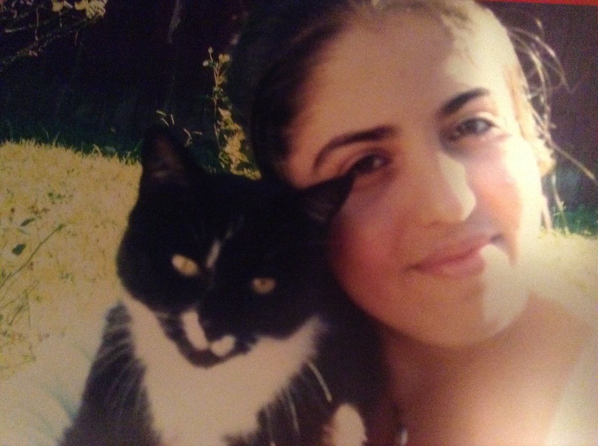 #ThrowbackThursday one of the best pictures my brother took of me with my old cat, Kitty when I was 16. Kitty was such a sweet cat. She would share her food with another black cat. She loved to sit in the garage + listen to Arabic folk music with my mother. I miss her so much.
