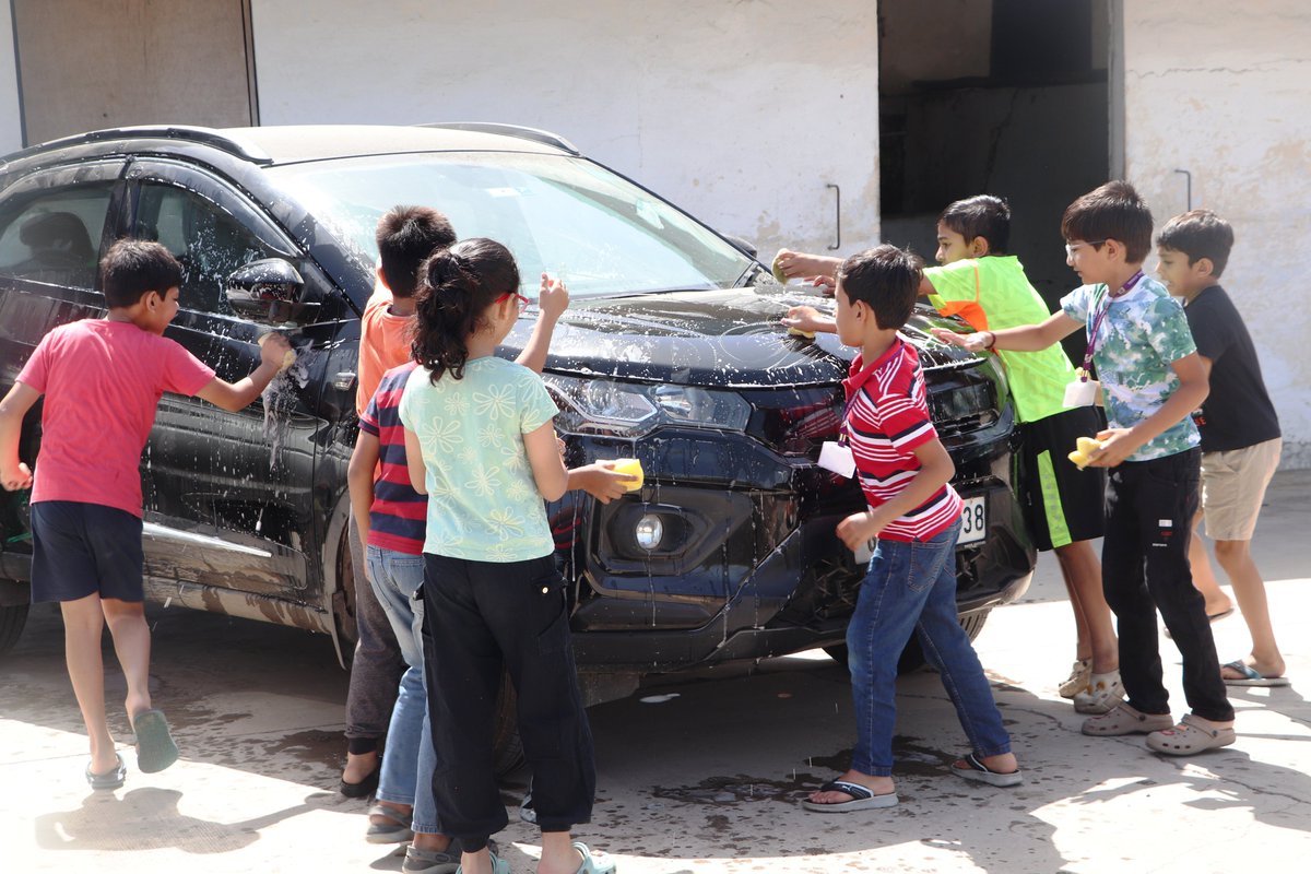 Learning Life Skills:

'Washing the car is the perfect job for children of all ages and abilities to get involved in!' 
Not only it's an amazing sensory learning experience but it also allows children to enjoy the pleasure of 'doing' with others.