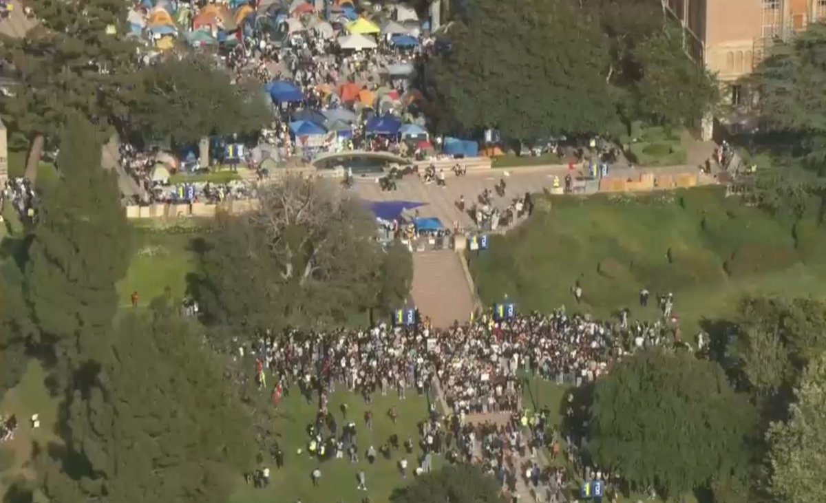 Huge groups of anti-Israel protesters have now shown up on both sides of the UCLA encampment, apparently in an effort to defend it as it appears law enforcement action may be imminent tonight as repeated dispersal orders are being given at the camp. (Pics 2 different sides).