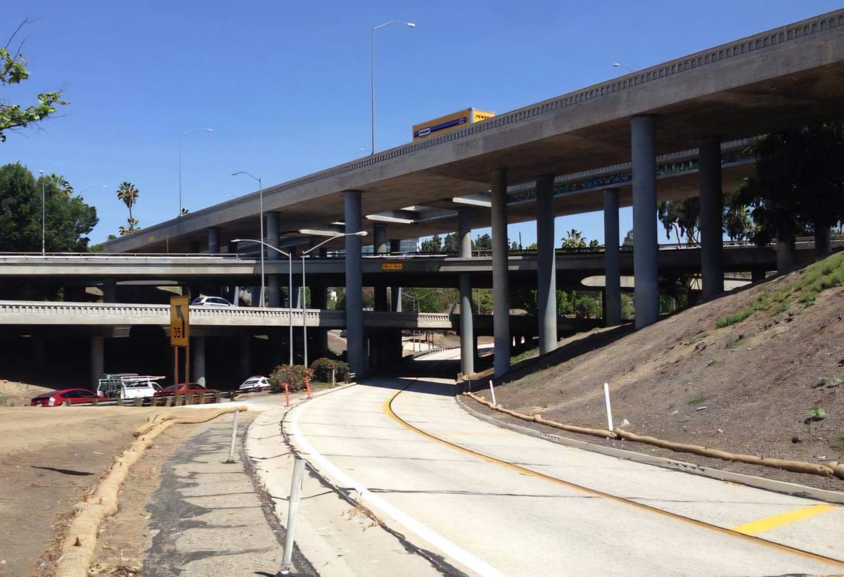 2014 - Famed four level interchange, where the Hollywood (US-101) and Harbor (CA-110) Fwys, plus Arroyo Seco Pkwy (CA-110) meet near the LA civic center. Columns have been seismically retrofitted and bridge railing has been upgraded. Photo by Myrna Dominguez.