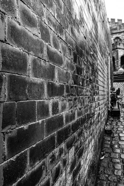An old #wall shows the #pollution, #age and #history of the city of #Stockport. Rostron Brow has #stories and #tales going back to the 17th century. Shot by a #local #Cheshire #photographer, see more at darrensmith.org.uk #blackandwhitephoto #blackandwhite #StreetArt #photo