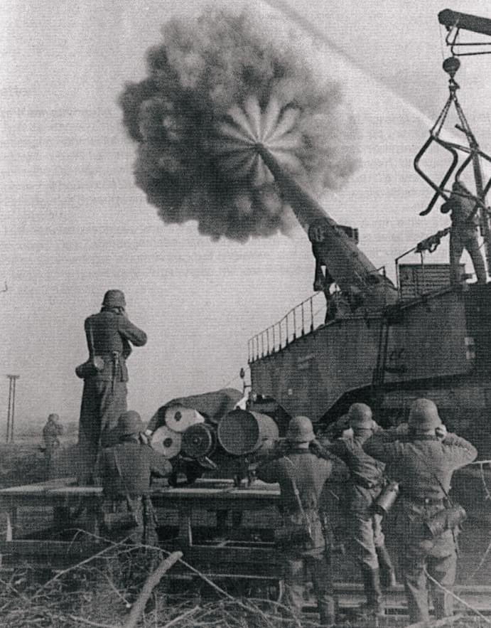 A German Krupp 28-cm-Kanone 5 (Krupp K5) heavy railway gun firing, 1944.