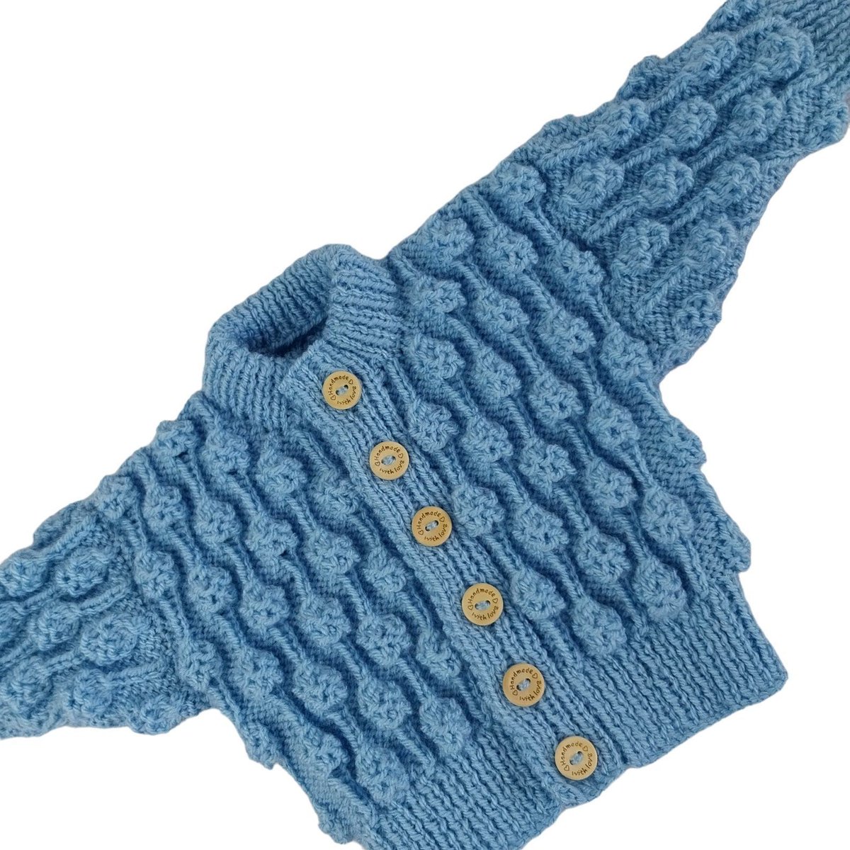 Looking for the perfect baby gift? This hand-knitted blue cardigan is just what you need! Fits babies 0-6 months. Grab it now on #Etsy: knittingtopia.etsy.com/listing/171835… #knittingtopia #babygifts #handmade #MHHSBD #craftbizparty #supportsmallbusiness #atsocialmedia