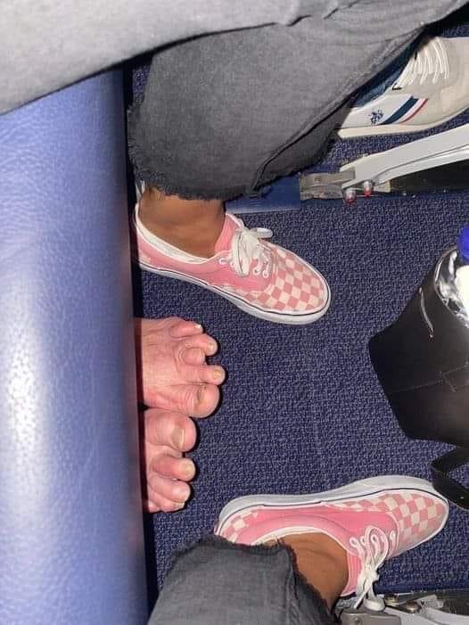 On the plane to Benidorm and the person behind you just wants to stretch their legs 😳