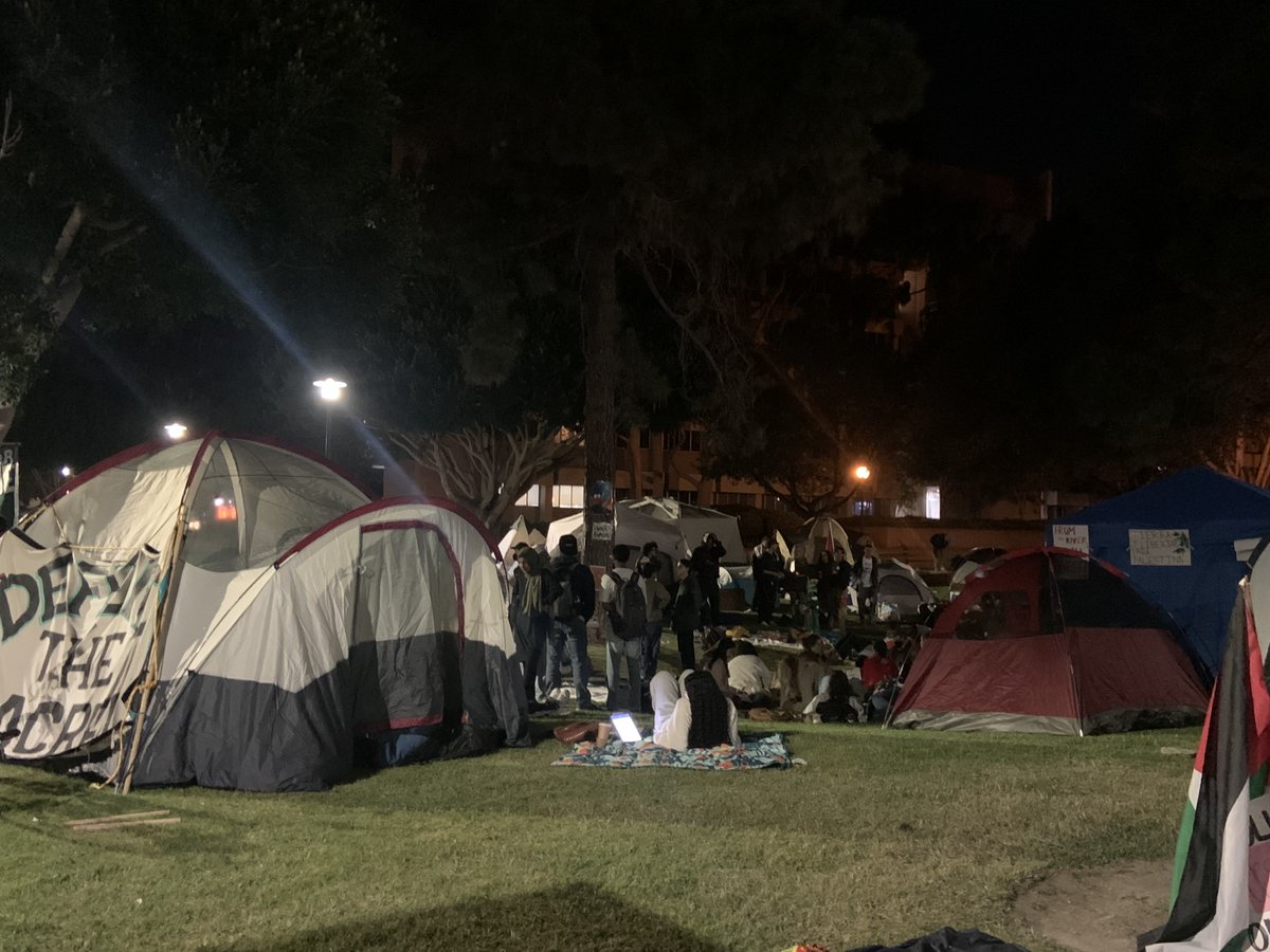 dailynexus's tweet image. As of 10:30 p.m., the encampments remain peaceful and the group is stocked with perishable foods and medical supplies. Several participants intend to stay overnight, and a media spokesperson said the encampments will stay put for at least a few days.