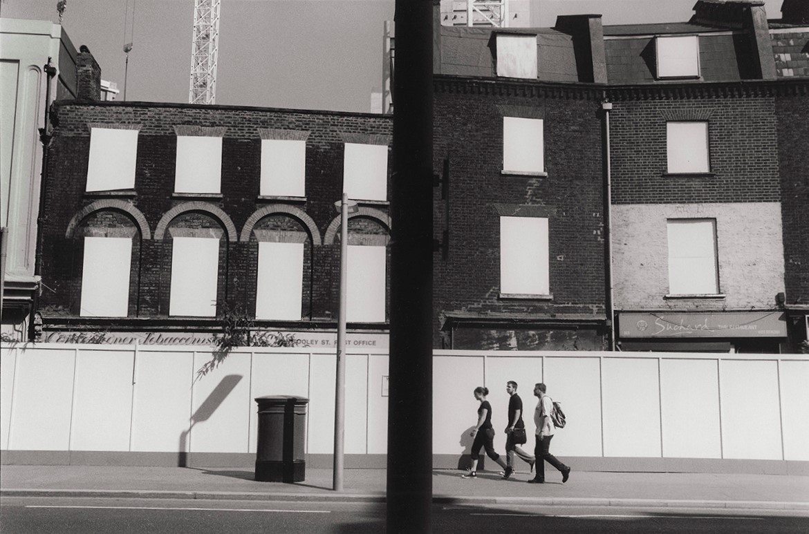 Figures in the city no. 186
Tooley Street, London, 2010
Silver gelatin print
#London #city #Southwark #streetphotography #men #woman #figures #pedestrians #blackandwhitephoto #monochrome #analogue #film #bnw #urbanlandscape #cityscape #development #demolition #walking #boarded