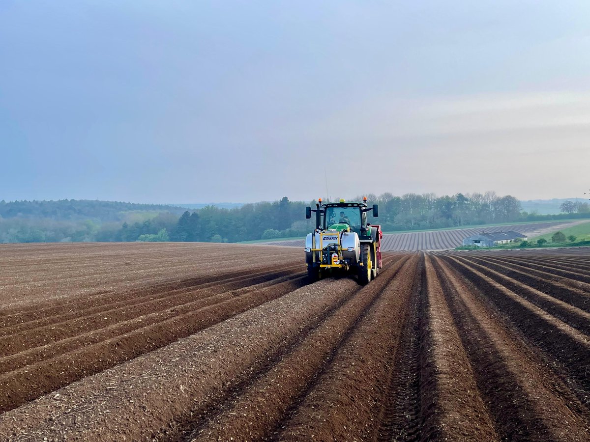 Hard at work planting on the Lincolnshire Wolds yesterday, considering ourselves lucky to work in such picturesque surroundings #britishfarming #potatoes 🥔🥔🥔