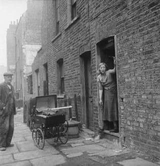 A photograph of the Outside of a terraced house in Cynthia Street, Islington in 1956.
