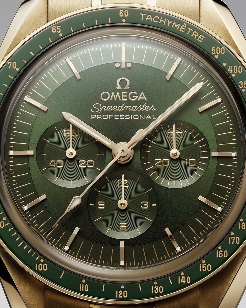 @OMEGA Moonwatch. The famous Moonwatch dial in PVD green, featuring hands, indexes, and applied elements all in 18K Moonshine™ Gold. A Co-Axial #MasterChronometer calibre 3861 sits behind.

#TourneauBucherer #OMEGA #Moonwatch