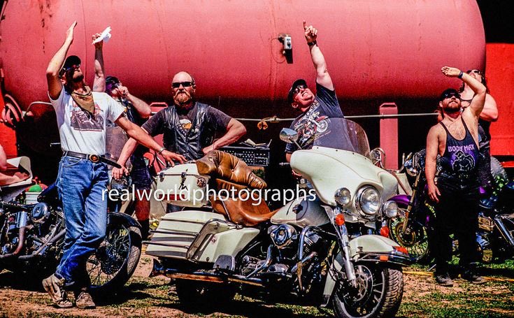 Bikers look to the skies in British Columbia, Canada. Gary Moore photo. Real World Photographs. #bikers #canada #motorcycle #malmo #sweden #people #places #britishcolumbia #garymoorephotography #realworldphotographs #nikon #photojournalism #photography