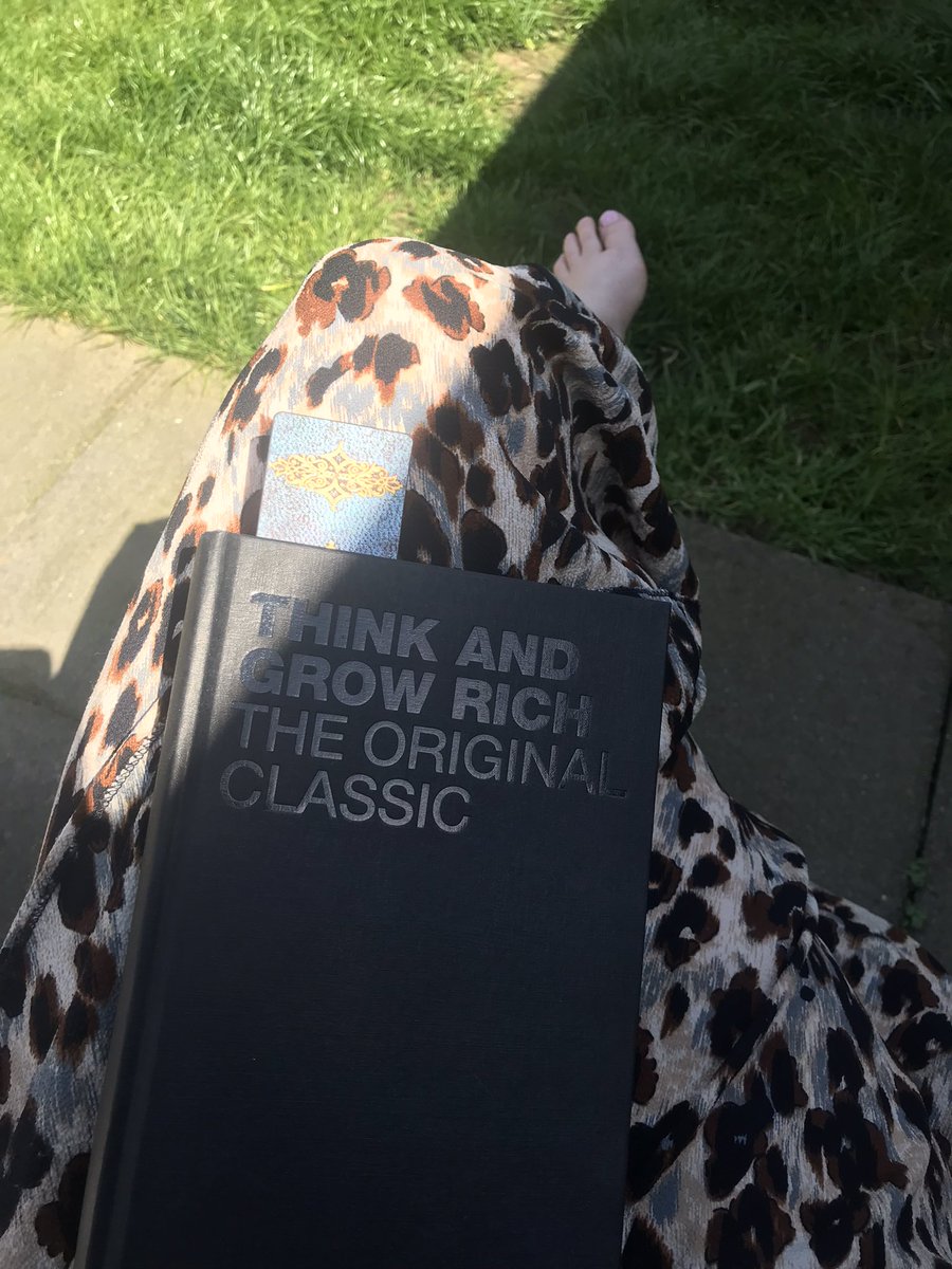 Enjoying my time in the sun and a good book☀️📖 Touch some grass when you can😉 #Reading #Sunny #Grounding #PositiveVibes #ThinkAndGrowRich #Mindset