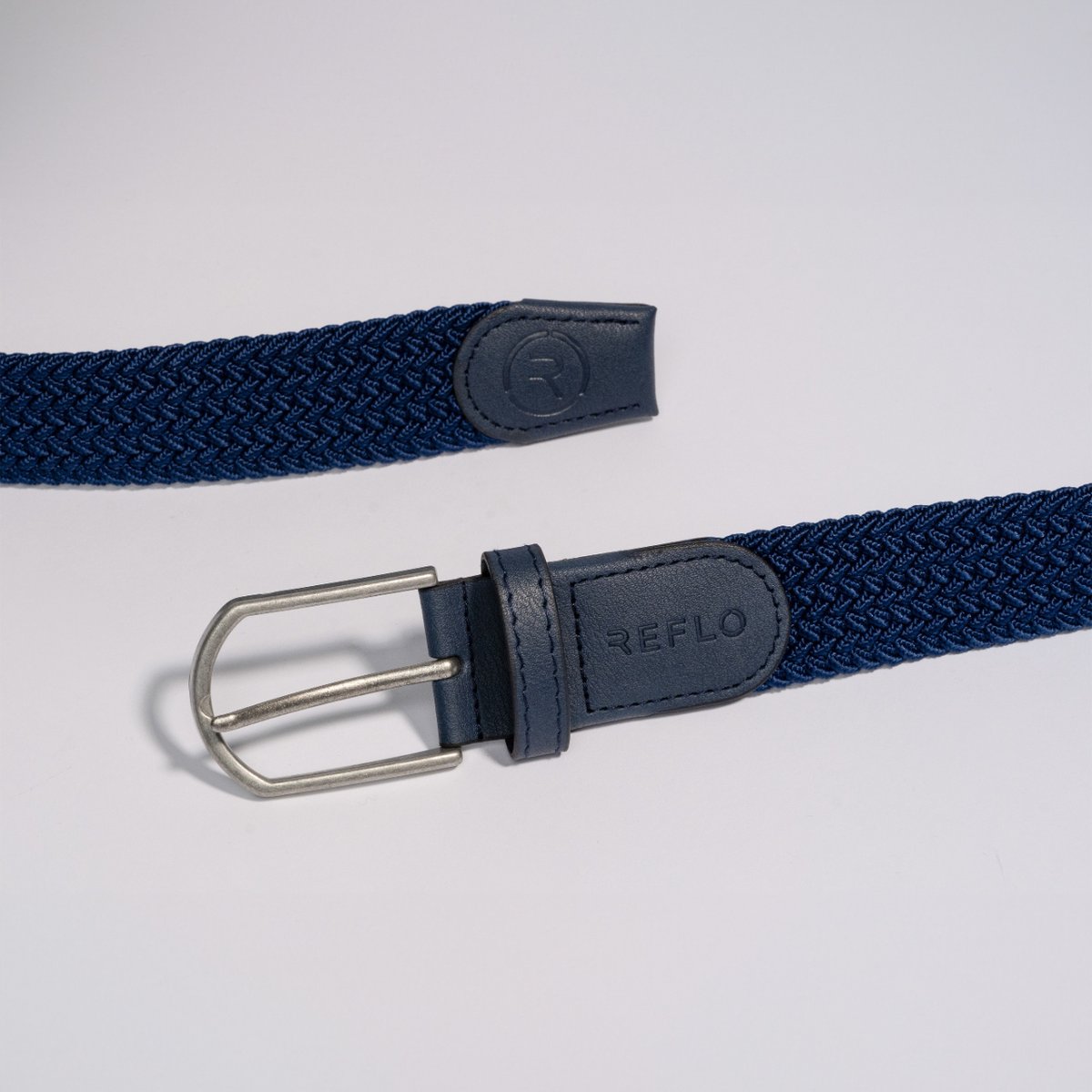 BUCKLE UP 👀 Introducing our new Tana Belts. Crafted using recycled polyester fibre, the belts are stretchy and flexible, made to support you on and off the golf course. Choose from four colours: black, grey, navy, & dark forest. Shop now at Reflo.com #TeamReflo