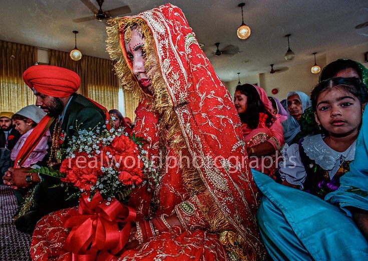 A bride at a Sikh wedding in British Columbia, Canada. Gary Moore photo. Real World Photographs. #sikh #wedding #bride #canada #kelowna #religion #garymoorephotography #realworldphotographs #nikon #photojournalism #photography