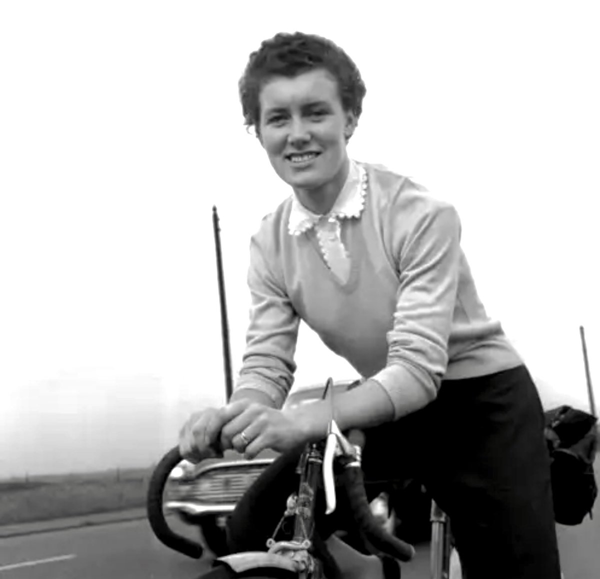 Beryl enjoying some downtime with the saddlebag on and a touring trip during the early 1960s.