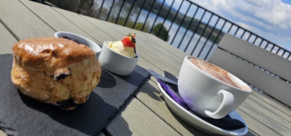 'Indulge in the quintessential British experience with our delightful Cream Tea.   Enjoy on the terrace, where you can bask in the warmth of the sunshine and savour breath-taking views overlooking the beauty of Windermere.' 

#creamtea #sunshine #views #terrace
