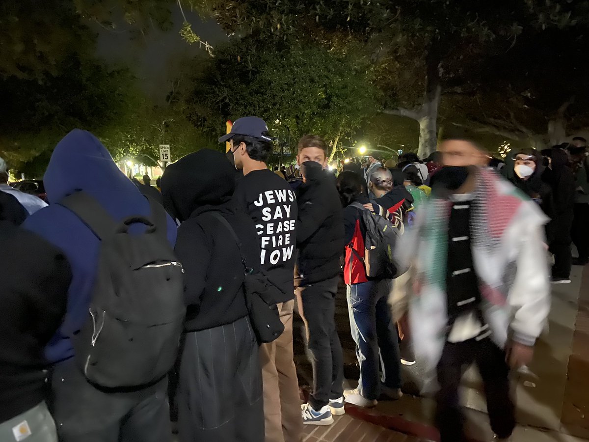 Police have entered the perimeter of the encampment at UCLA. Shouts of “what side of history do you want to be on,” “hold the line,” and “we’re not leaving,” rise up from demonstrators