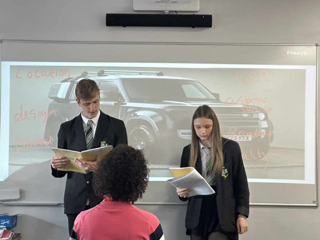 Year 10 Business students presenting their ideas on product differentiation for the @LandRover_UK Defender. @LuttHigh