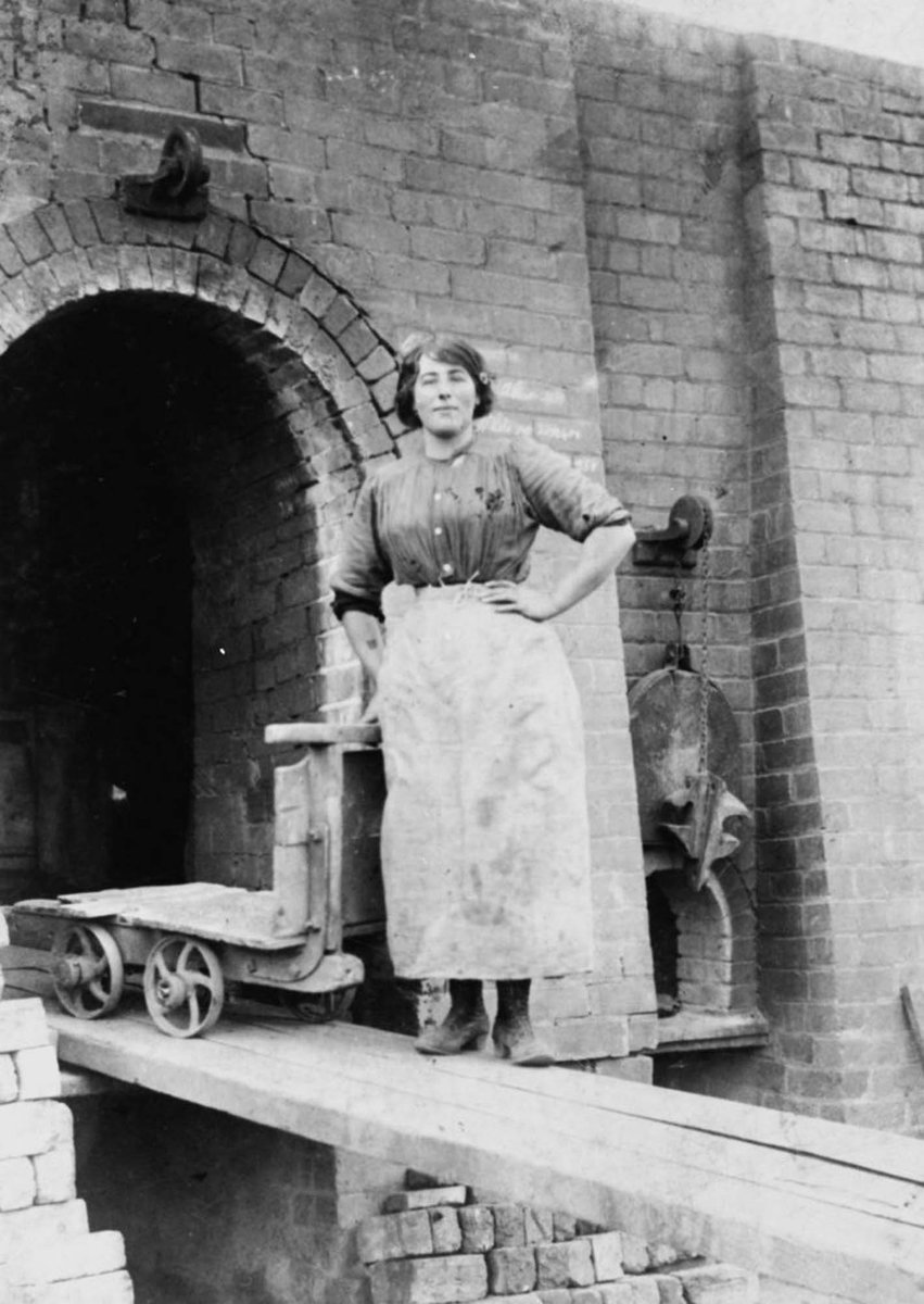 Today's #OnlineArtExchange is women in photography and we thought we'd share this amazing photograph of Mary McMahon working at the Carfin Brickworks circa 1910. In this photo she is standing outside one of the kilns where bricks would be fired.