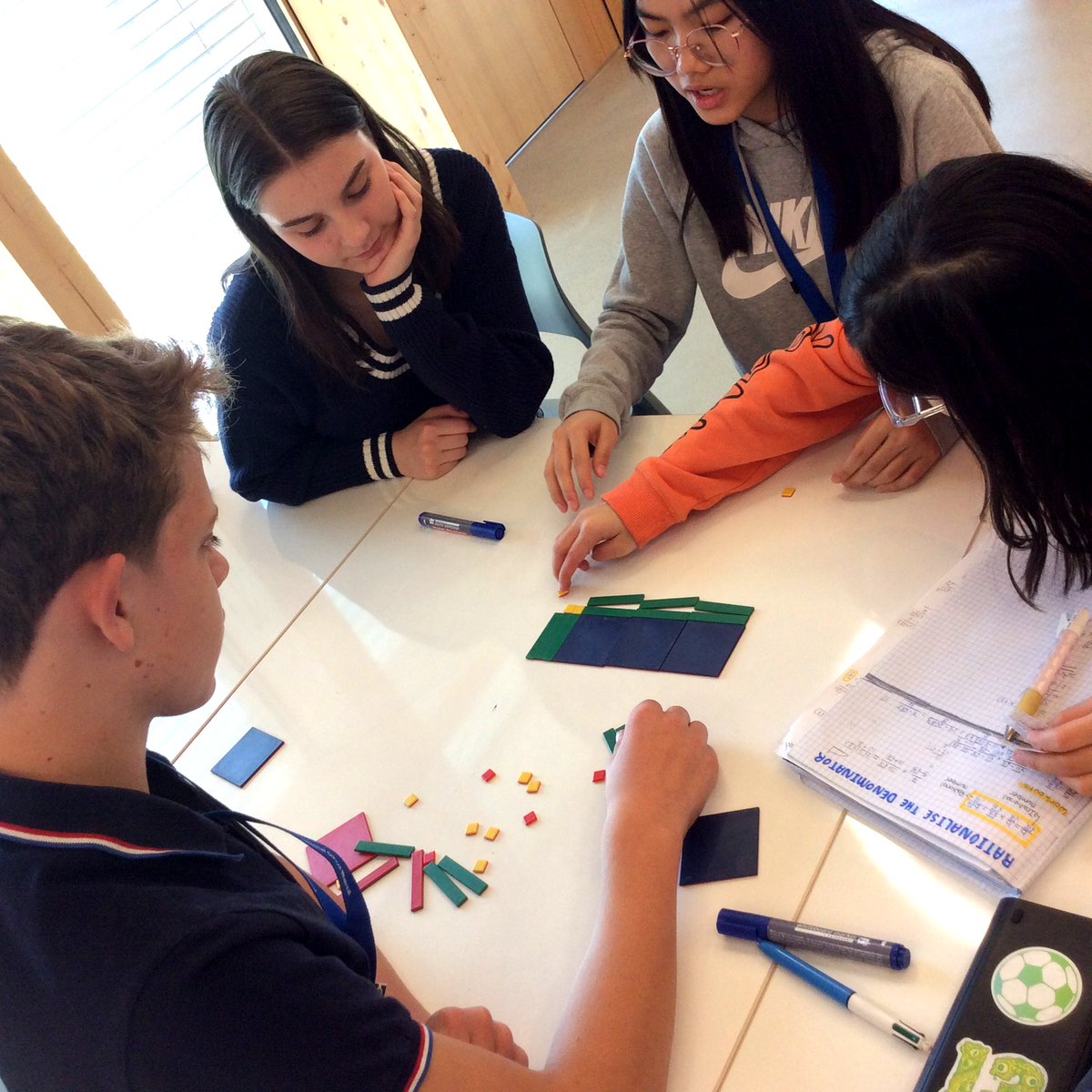 #WeLoveMath at ISR; Grade 8 are using algebra tiles to solve quadratic equations. #ISRMYP #ISRLearns