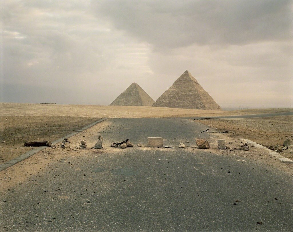 Richard Misrach. Roadblock and pyramids, Eygpt, 1989.