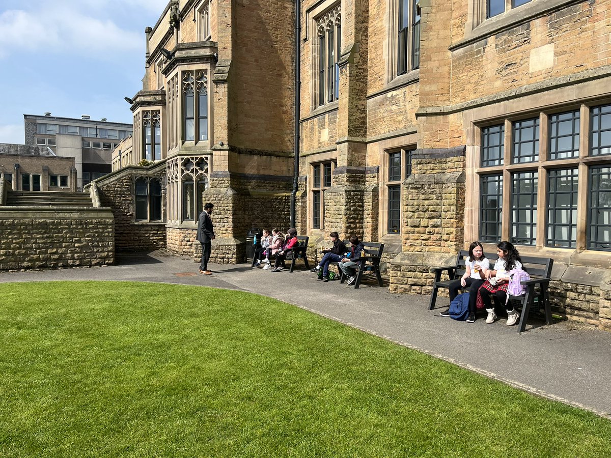 Year 5 enjoying cookies and drinks in the sun ☀️