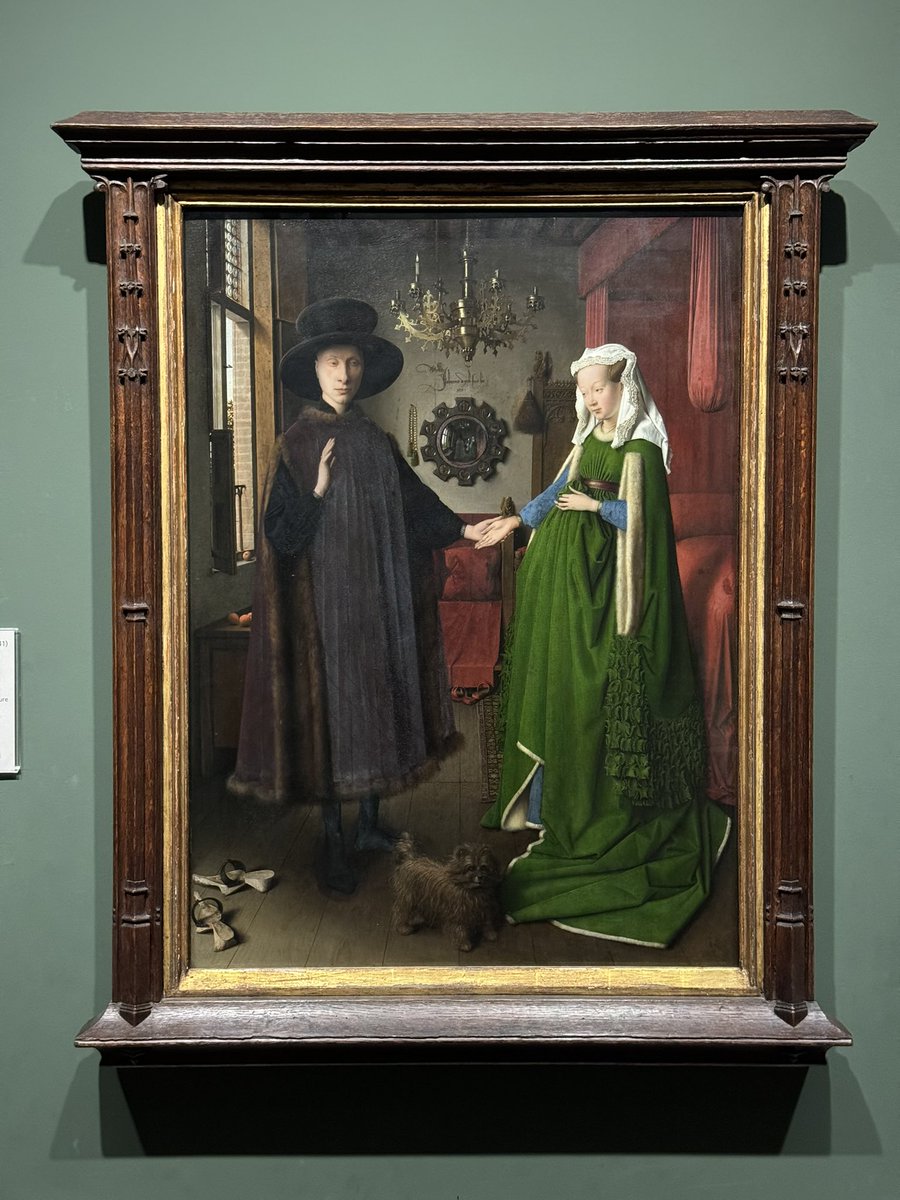 psframes's tweet image. Today we re-framed Jan van Eyck’s Arnolfini Portrait. We replaced the late 19th century gothic fantasy frame with a newly acquired somber gilded 15th century moulding. The figures appear larger and the details crisper without the competition of the incongruous carving.