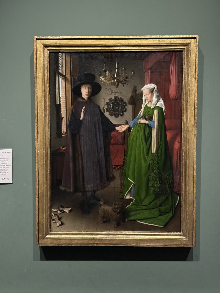Today we re-framed Jan van Eyck’s Arnolfini Portrait. We replaced the late 19th century gothic fantasy frame with a newly acquired somber gilded 15th century moulding. The figures appear larger and the details crisper without the competition of the incongruous carving.