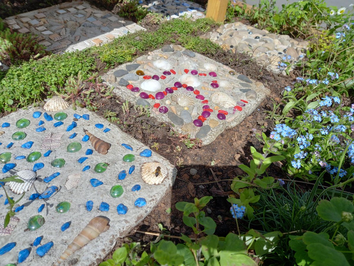 At @TCVhollybush, teamwork is at the heart of everything we do. Our volunteers, participants, and staff members come together, each bringing their unique skills to the table. Our garden border reflects this diversity, with a mix of edibles, wildlife habitats and unique pavers!