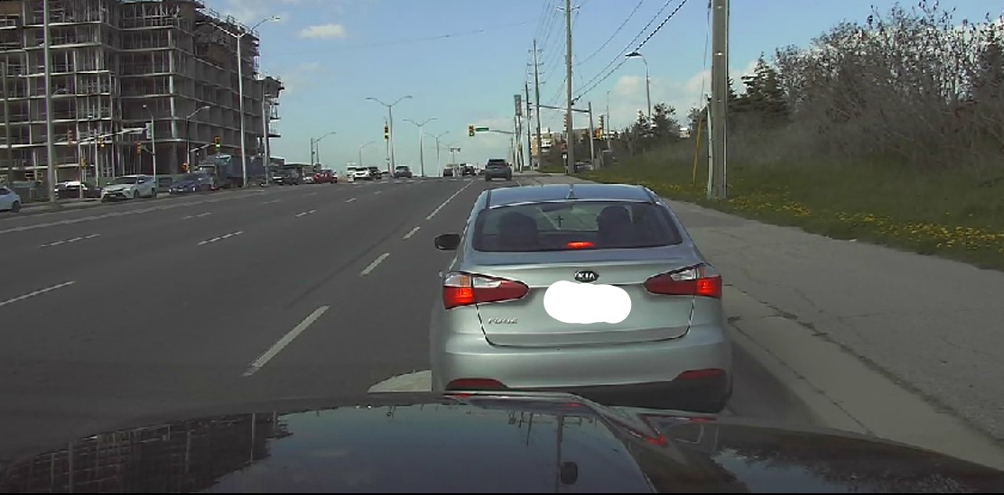 Oakville District Response Unit stopped this car on Dundas St yesterday after observing an infant on the rear passenger's lap. 
The passenger who was holding the child also was not wearing a seatbelt. Driver and passenger charged accordingly and a car seat was brought. ^JW