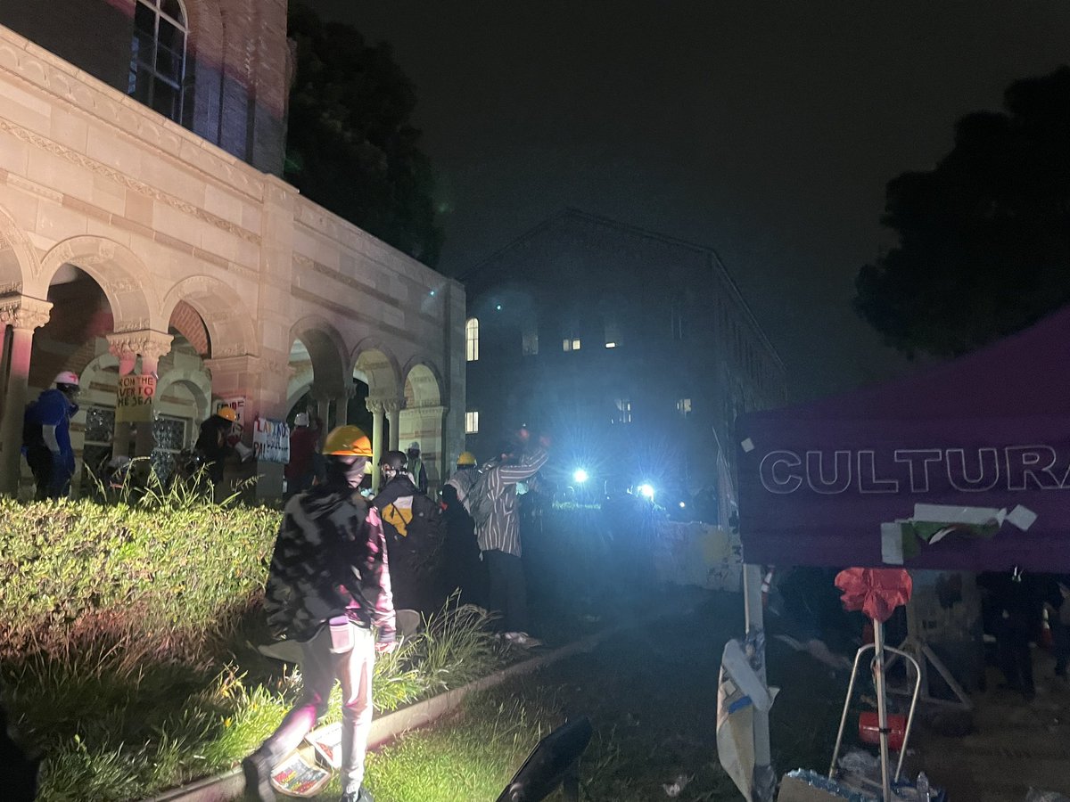 LAPD just shot a protester in the fucking face. A psycho with the 40mm gun is just pointing the shit at everyone. The center light is attached to the 40mm launcher.