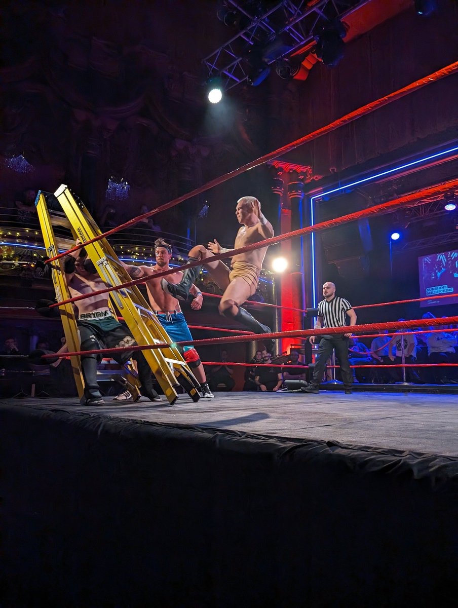 What a terrifying moment to be @ElNino_Wrestler as @ChuckMambo holds the ladder and #ConnorMills absolutely launches himself!