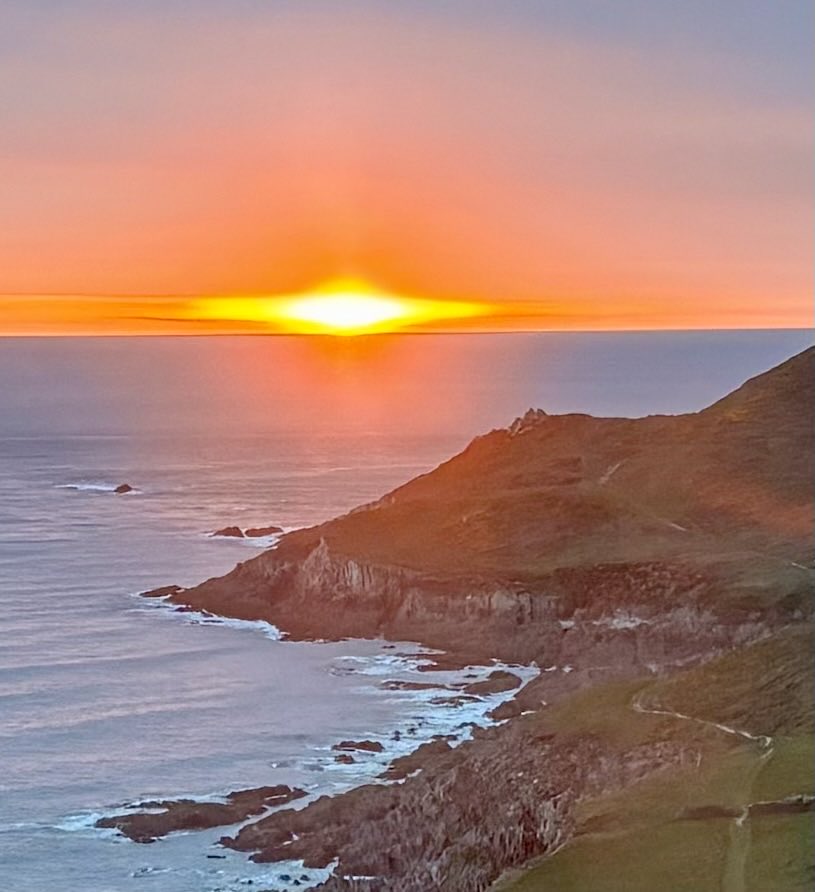 Sun looking rather like a golden, glowing alien starship last night. Mortehoe magic. Morte Point, Woolacombe, North Devon.