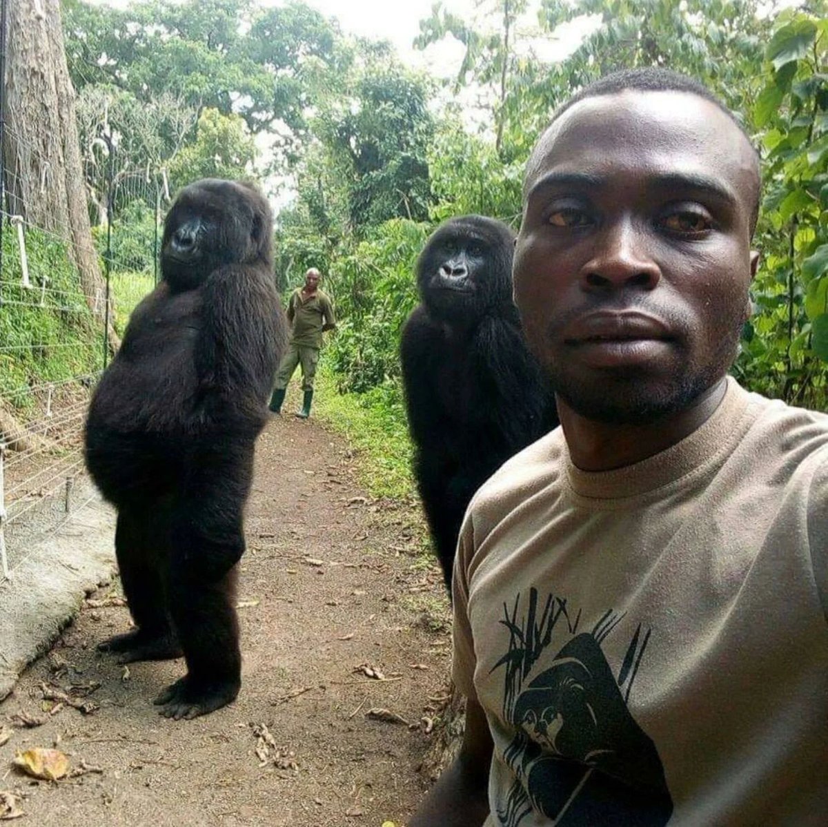 average south Spanish man taking a selfie with two Portuguese