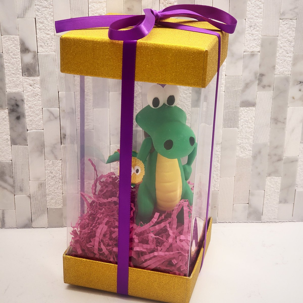 One of many little Crocs hand placed into their little gift boxes (with choice of ribbon color), ready to be signed and adopted to their new owners for 2024 RocketTown Comic Con in Lompoc, CA May 4th and 5th! #croclegendofthegobbos #cute #giftbox #gift #signedmerch #comiccon…