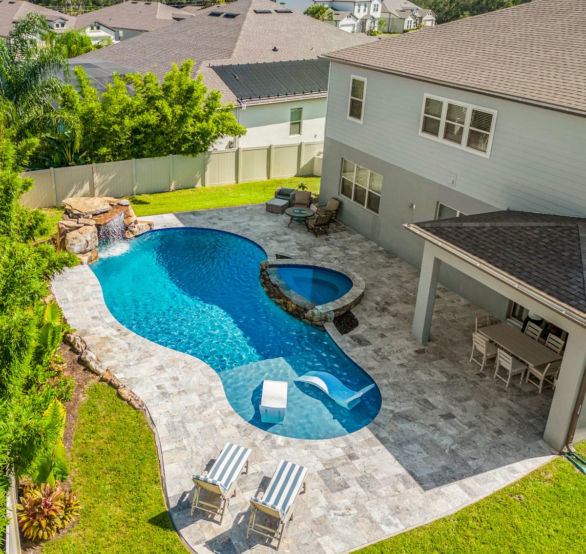 We design and build backyards that make every day feel like a vacation day. #AllCustomPools #orlando #outdoorspaces #backyardgoals #pooldesign #poolbuilder #poolside #poolparty #orlandoflorida #backyard #luxuryhomes
