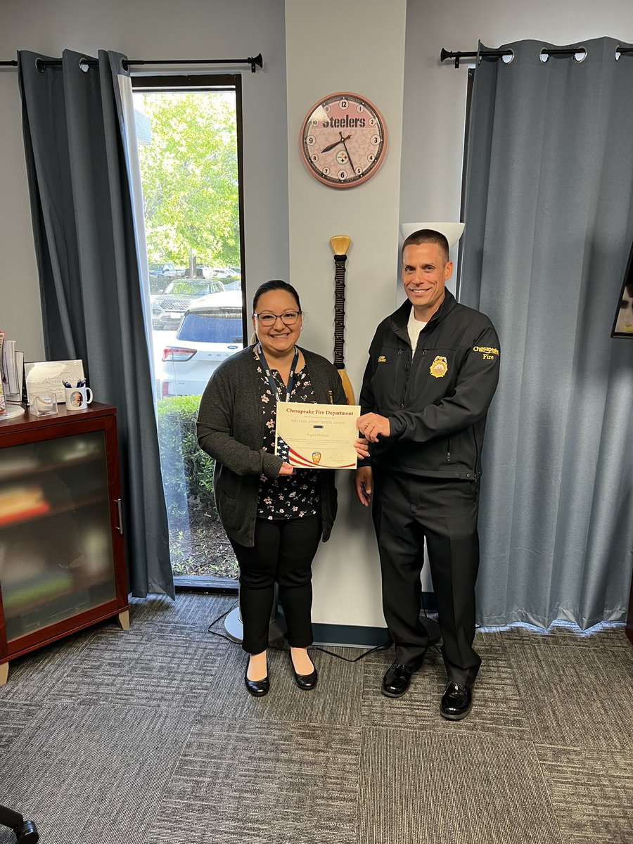 Fire Chief Gulisano presented Ingrid 
“Jo” Phillips with a Military Appreciation Award for her 22 years of service in the U.S. Navy. Jo currently serves as the Program Manager for the Fire Department’s Mobile Integrated Healthcare Program. Thanks for
your dedicated service Jo. 🇺🇸