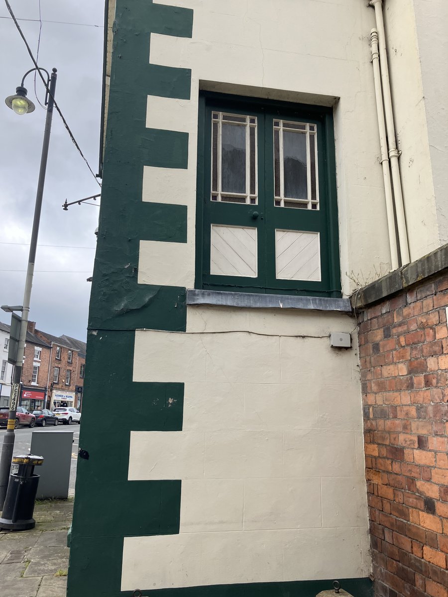 These doors that look completely out of place are on the side of the old coach house in Welshpool.  Apparently they were used for putting trunks on the top of coaches.  #AdoorableThursday